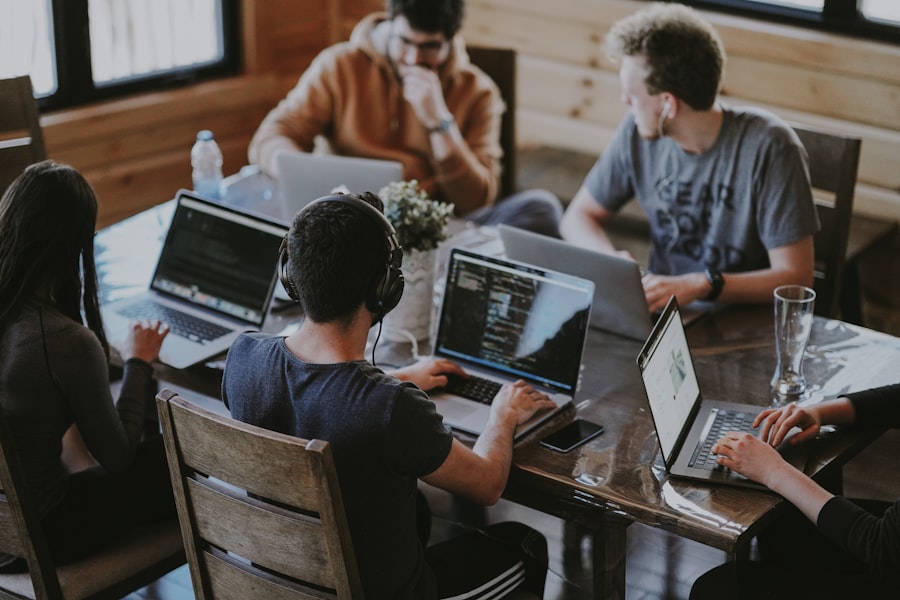 Authentic team working side by side solving operational problems
