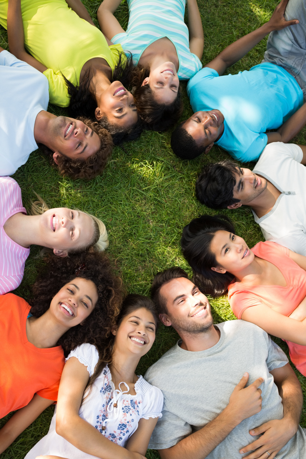 Neighbors gathered outdoors talking at a community event